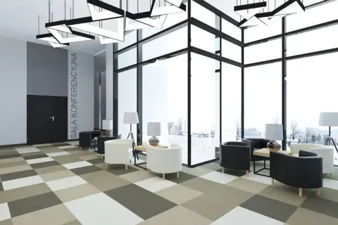 Nowoczesne wnętrze hotelu Park Inn Hotel Katowice z wygodnymi fotelami i panoramicznymi oknami.