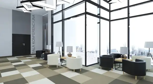 Nowoczesne wnętrze hotelu Park Inn Hotel Katowice z wygodnymi fotelami i panoramicznymi oknami.