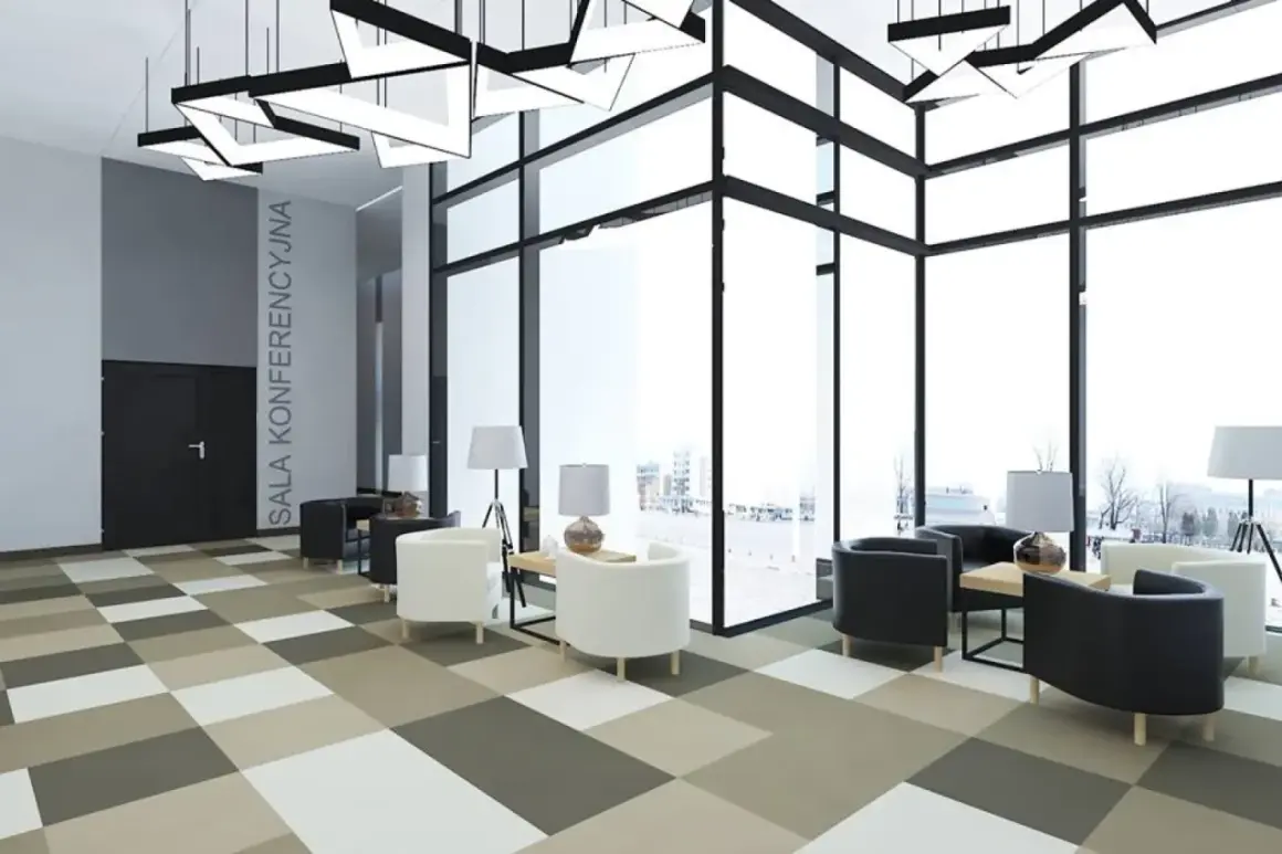 Nowoczesne wnętrze hotelu Park Inn Hotel Katowice z wygodnymi fotelami i panoramicznymi oknami.